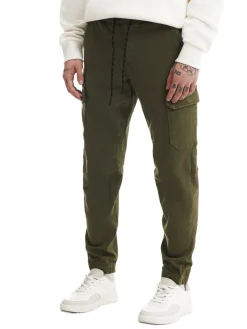 Cropp Spodnie*Ciemnozielone joggery basic z kieszeniami cargo zielony