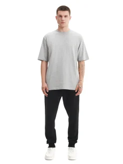 Cropp Spodnie*Czarne gładkie joggery regular czarny