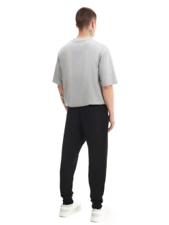 Cropp Spodnie*Czarne gładkie joggery regular czarny