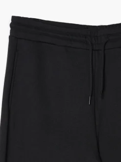 Cropp Spodnie*Czarne gładkie joggery regular czarny