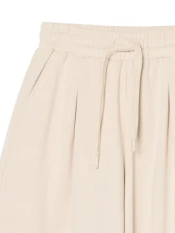 Cropp Spodnie*Kremowe joggery z wysokim stanem kremowy