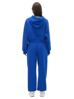 Cropp Spodnie|Sety*e dresowe joggery z naszywką niebieski