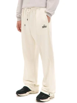 Cropp Spodnie*Spodnie dresowe z zatrzaskami kremowy