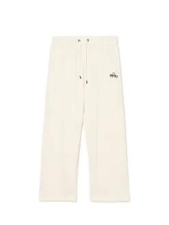 Cropp Spodnie*Spodnie dresowe z zatrzaskami kremowy